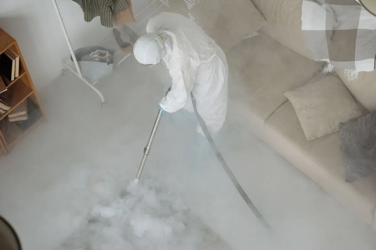 Biohazard cleanup technician in protective equipment, North Puyallup, WA